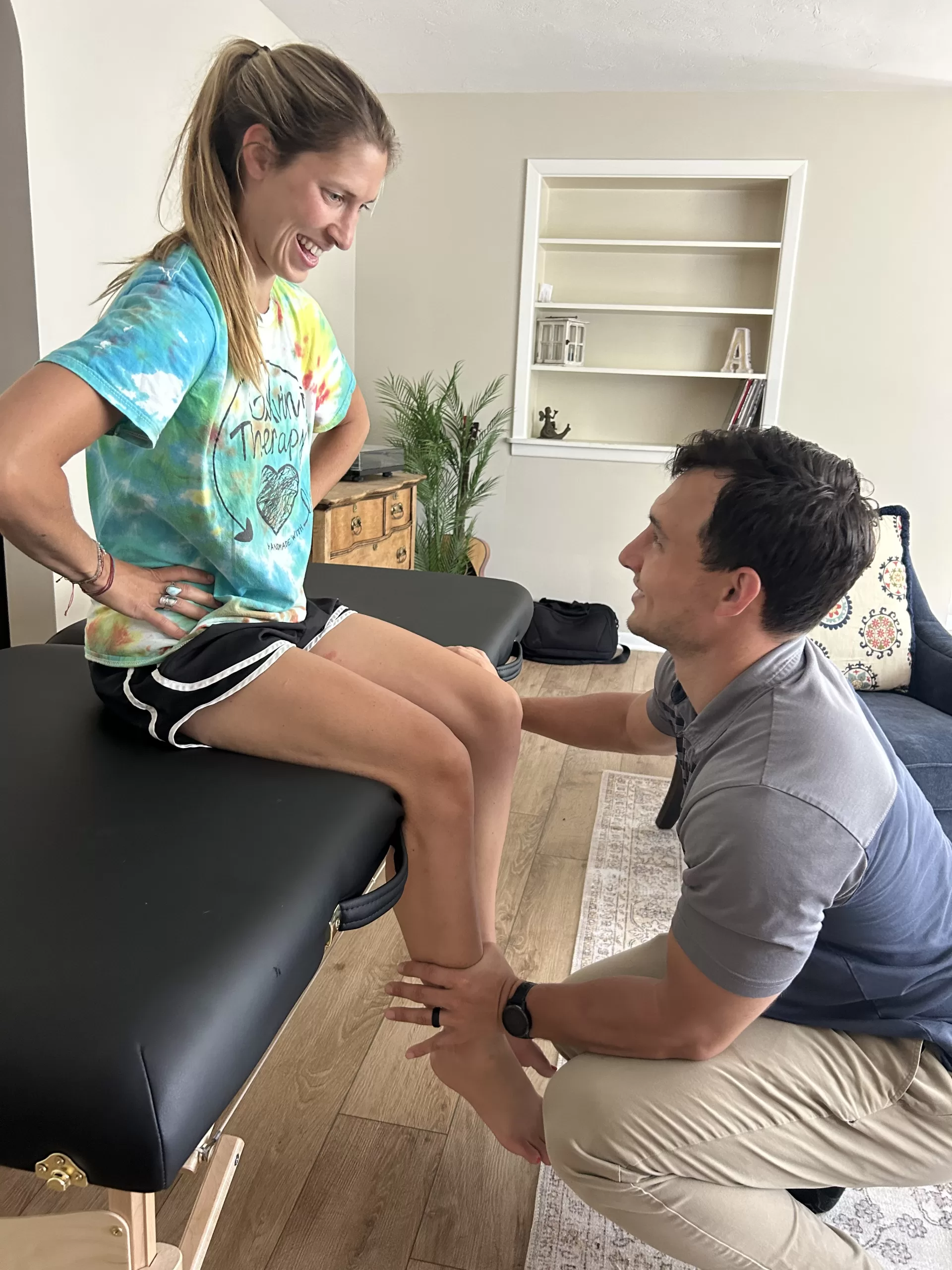 Testing the strength of a patient during a mobile physical therapy treatment.